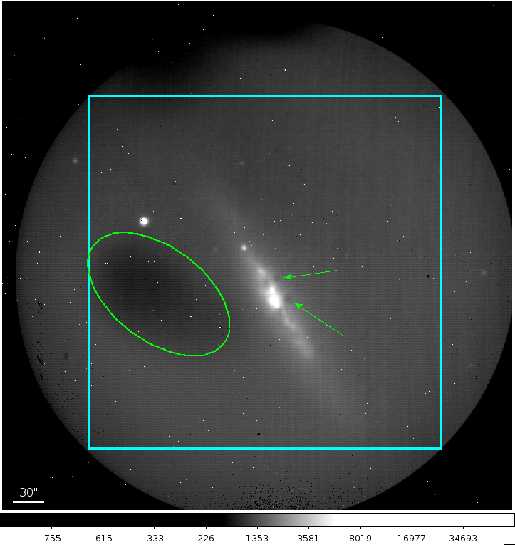 Raw data with a large square and an oval inscribed around a darker area. Arrows point to small dark circles.